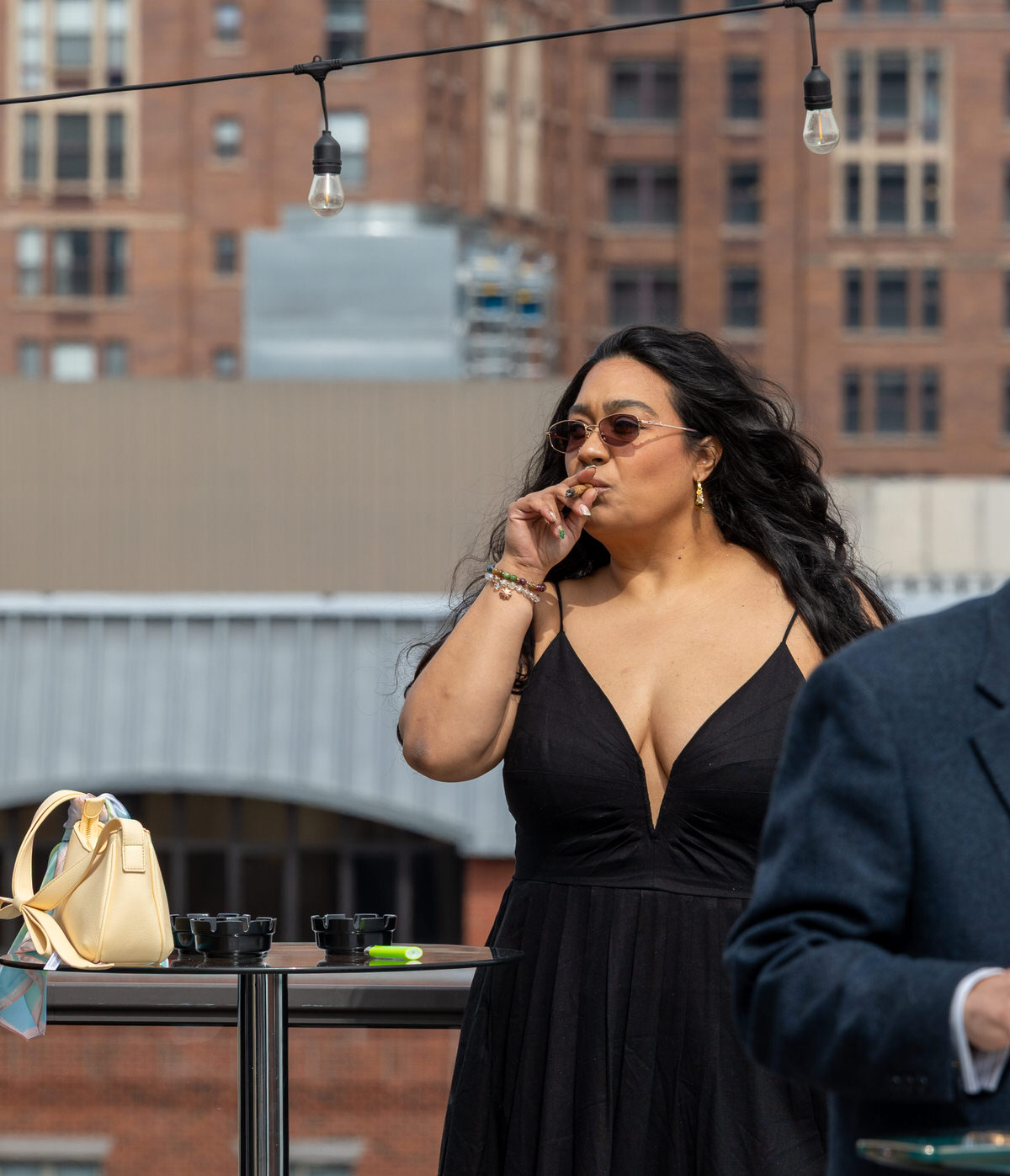 woman in dress smoking a joint