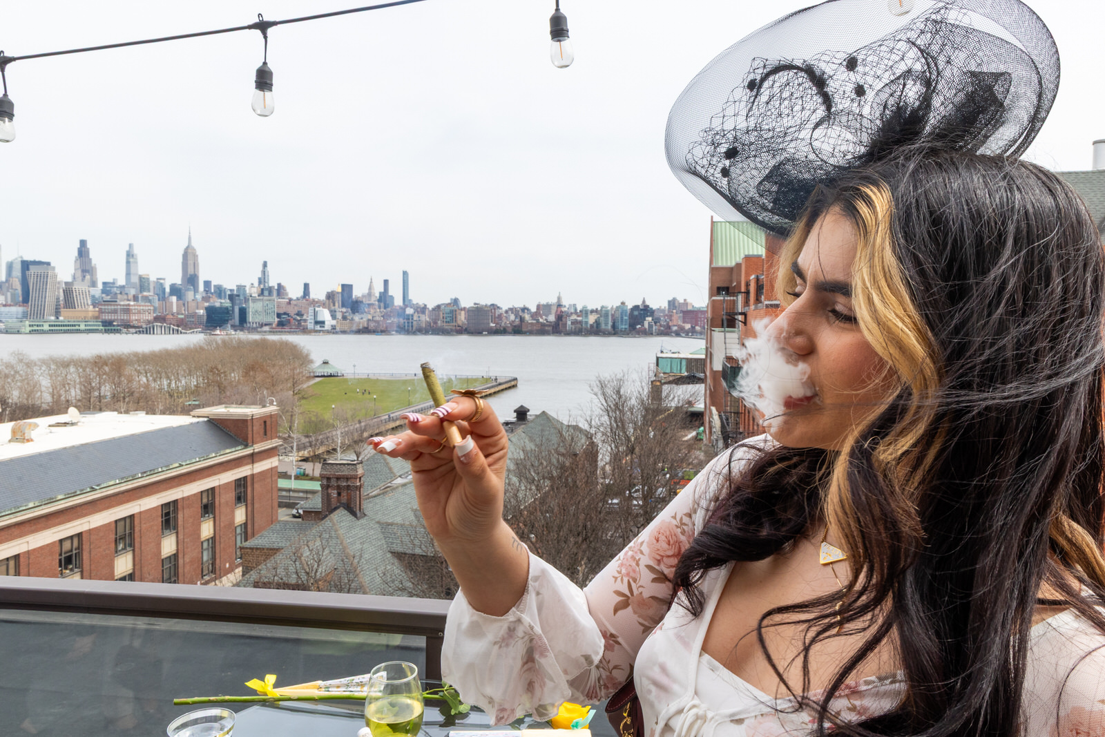 High Tea woman smoking joint with smoke billowing