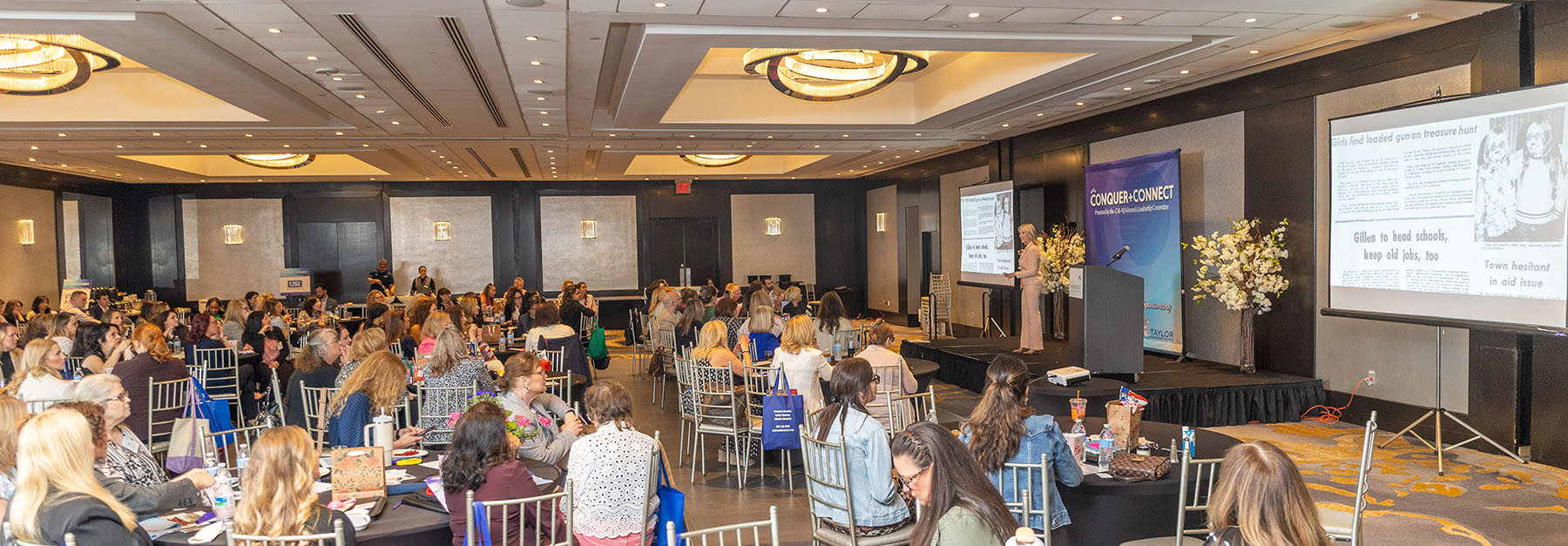 Large Conference audience listening to keynote speaker